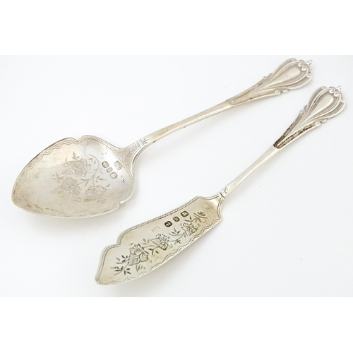 673 - A Victorian silver butter knife and preserve spoon hallmarked Birmingham 1895, maker Joseph Gloster.... 