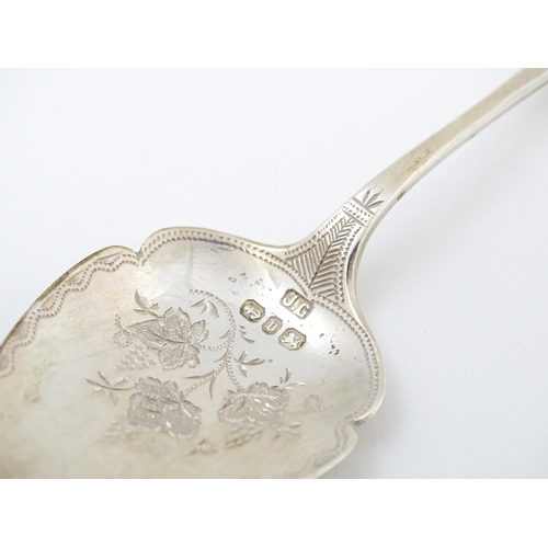 673 - A Victorian silver butter knife and preserve spoon hallmarked Birmingham 1895, maker Joseph Gloster.... 