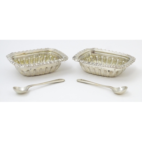 682 - A pair of silver salts hallmarked Birmingham 1908, maker Robert Pringle & Sons. Together with associ... 