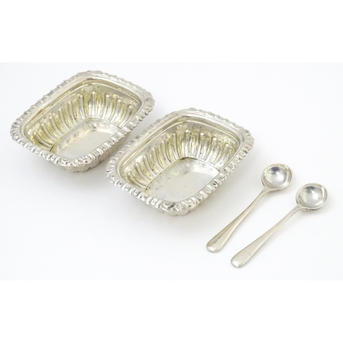 682 - A pair of silver salts hallmarked Birmingham 1908, maker Robert Pringle & Sons. Together with associ... 