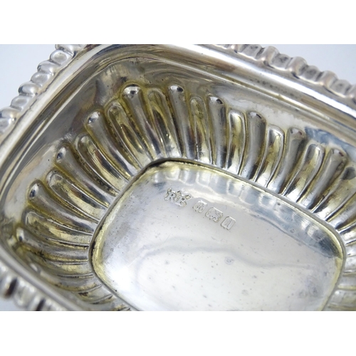 682 - A pair of silver salts hallmarked Birmingham 1908, maker Robert Pringle & Sons. Together with associ... 