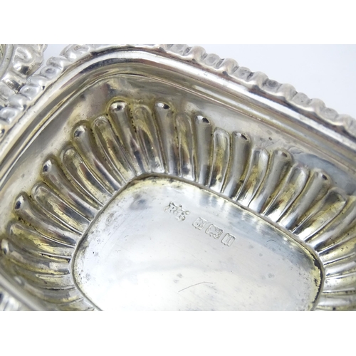 682 - A pair of silver salts hallmarked Birmingham 1908, maker Robert Pringle & Sons. Together with associ... 