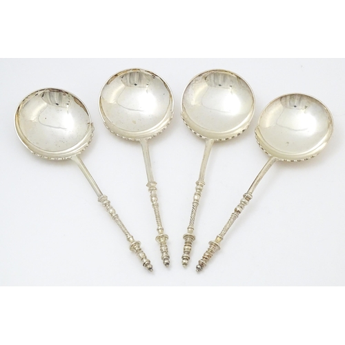 684 - A cased set of four silver serving spoons, hallmarked London 1905, maker Goldsmiths & Silversmiths C... 