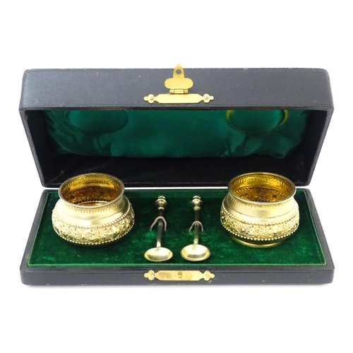 685 - Two Victorian silver gilt salts and spoons hallmarked London 1875 / 1878, maker William Hunter & Son... 