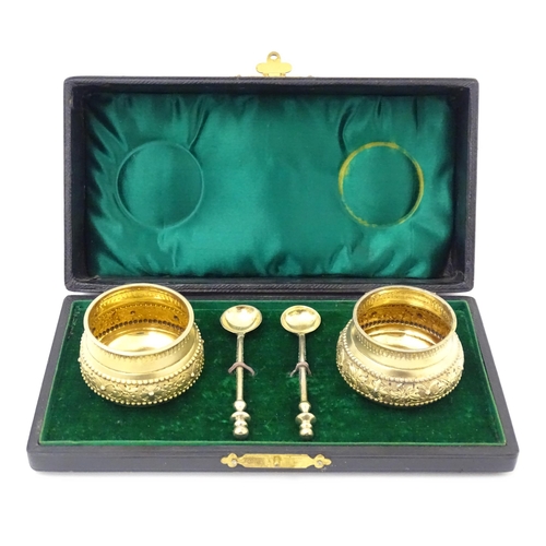 685 - Two Victorian silver gilt salts and spoons hallmarked London 1875 / 1878, maker William Hunter & Son... 