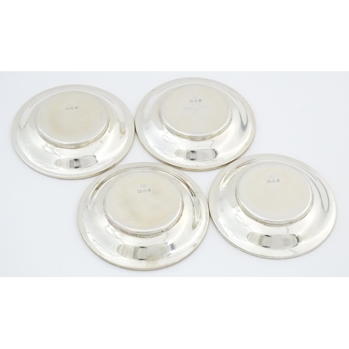 688 - A cased set of four silver bon bon dishes / small coasters, hallmarked London 1922, maker Garrard & ... 