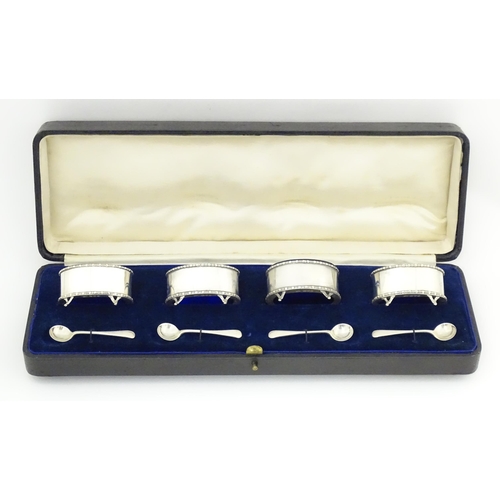 689 - A cased set of four silver salts hallmarked Chester 1916, maker Stokes & Ireland Ltd. Together with ... 