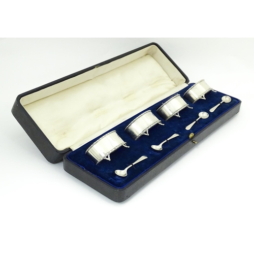 689 - A cased set of four silver salts hallmarked Chester 1916, maker Stokes & Ireland Ltd. Together with ... 