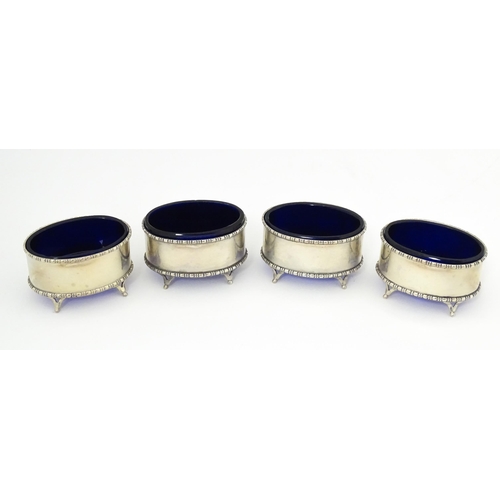 689 - A cased set of four silver salts hallmarked Chester 1916, maker Stokes & Ireland Ltd. Together with ... 