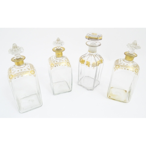 266 - Three 19thC spirit flasks with gilt detail, and a spirit flask with fruiting vine decoration (3+1). ... 