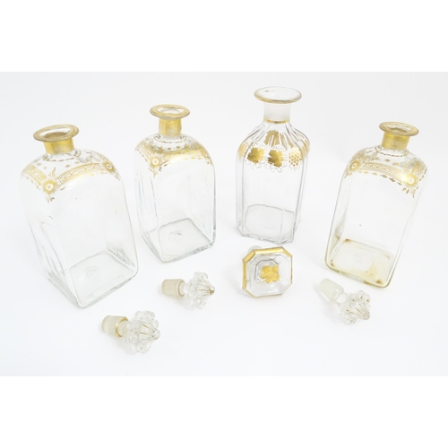 266 - Three 19thC spirit flasks with gilt detail, and a spirit flask with fruiting vine decoration (3+1). ... 