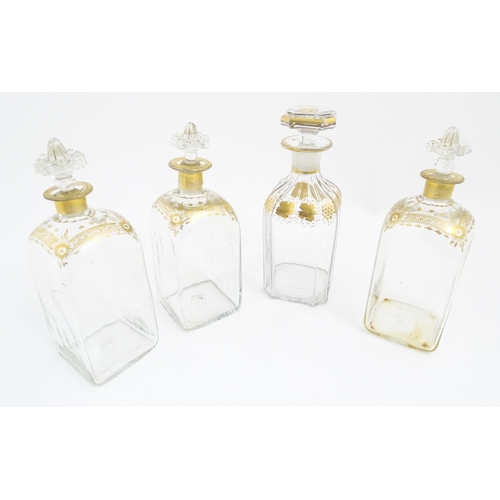 266 - Three 19thC spirit flasks with gilt detail, and a spirit flask with fruiting vine decoration (3+1). ... 