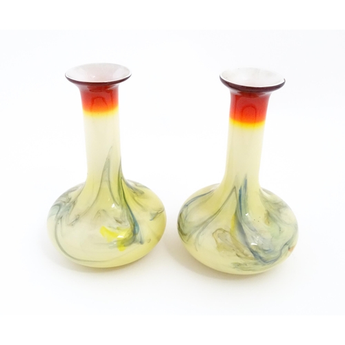 313 - A pair of mid century Art glass vases in the manner of Dalian Snowflake glass. Approx 7 1/2