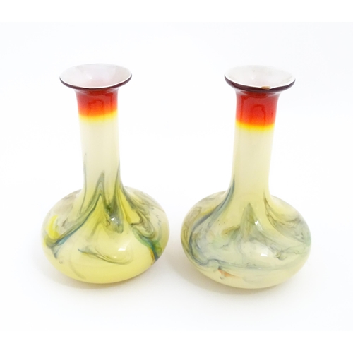 313 - A pair of mid century Art glass vases in the manner of Dalian Snowflake glass. Approx 7 1/2