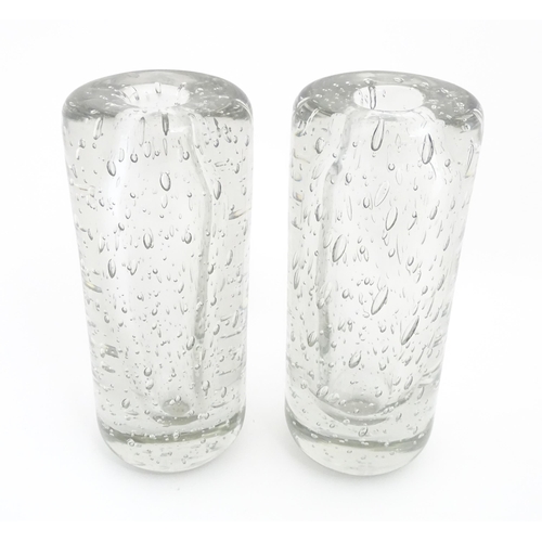 317 - Two mid century studio glass vases of clear glass with bubble detail. Approx. 10