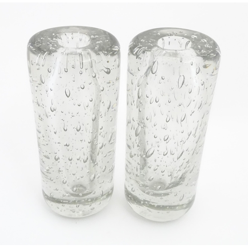 317 - Two mid century studio glass vases of clear glass with bubble detail. Approx. 10