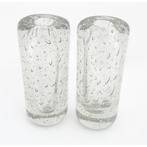 317 - Two mid century studio glass vases of clear glass with bubble detail. Approx. 10