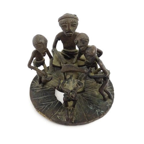 1190 - Ethnographic / Native / Tribal: An African / Ashanti / Asante cast bronze figural group with beheadi... 