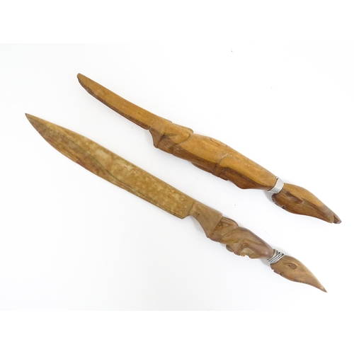 1196 - Ethnographic / Native / Tribal: Two carved African paperknives / letter openers with carved figural ... 