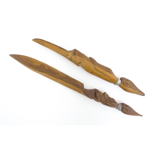 1196 - Ethnographic / Native / Tribal: Two carved African paperknives / letter openers with carved figural ... 