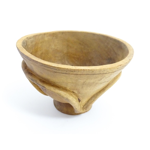 1199 - Ethnographic / Native / Tribal: A carved wooden footed bowl with incised decoration. Approx. 4 1/2