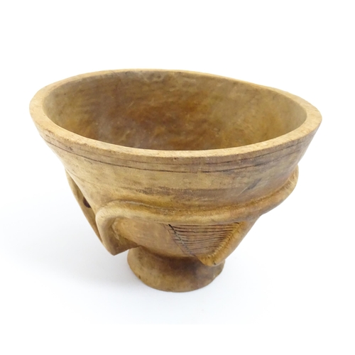 1199 - Ethnographic / Native / Tribal: A carved wooden footed bowl with incised decoration. Approx. 4 1/2