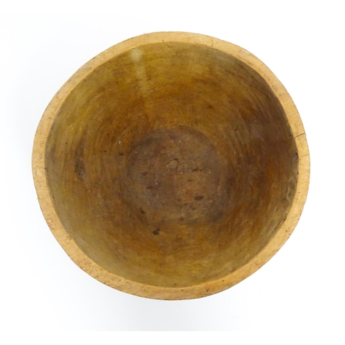 1199 - Ethnographic / Native / Tribal: A carved wooden footed bowl with incised decoration. Approx. 4 1/2