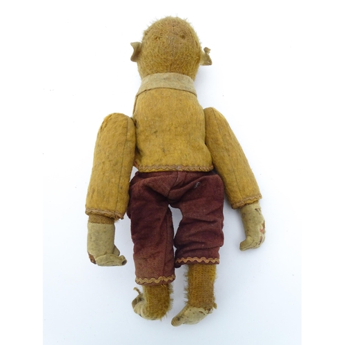 1432 - Toy: An early 20thC mechanical wind up tumbling / tumbler monkey toy with felt face, ears and feet, ... 