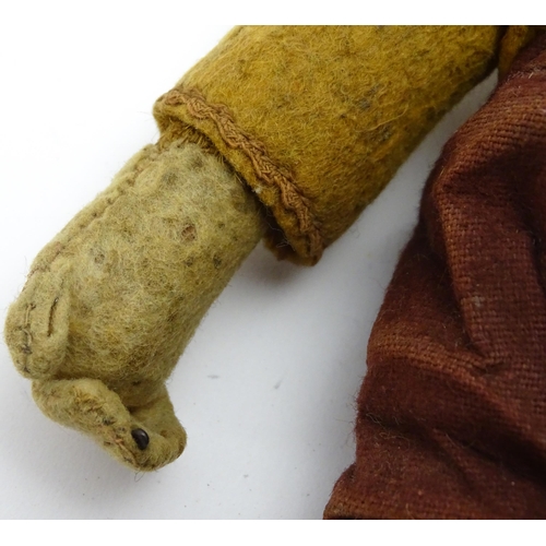 1432 - Toy: An early 20thC mechanical wind up tumbling / tumbler monkey toy with felt face, ears and feet, ... 