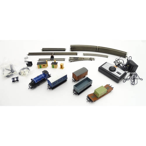 1438 - Toys: A Hornby OO gauge model railway train set Lowland Carrier, model no. R1163, to include track, ... 