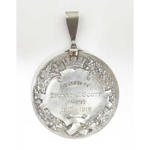 1231 - A Scottish silver medal titled High School of Dundee Dott Memorial Medal for Dux in the Art Departme... 