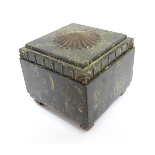 1233 - An Art Deco Ebena Bakelite box of squared form with floral motif to top. Marked under Made in Belgiu... 