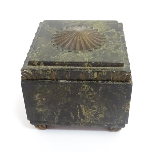 1233 - An Art Deco Ebena Bakelite box of squared form with floral motif to top. Marked under Made in Belgiu... 