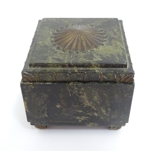 1233 - An Art Deco Ebena Bakelite box of squared form with floral motif to top. Marked under Made in Belgiu... 