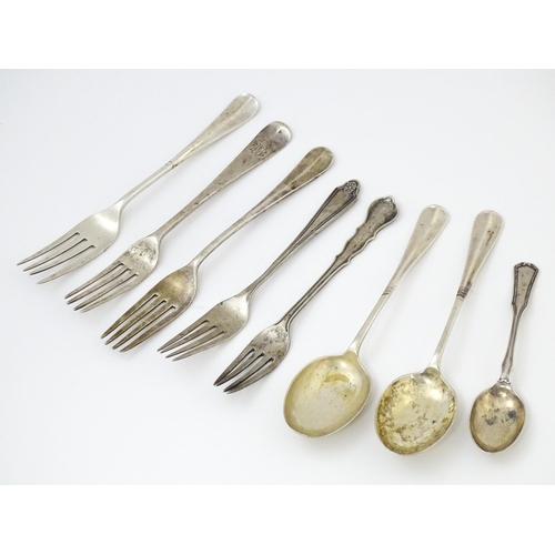 640 - A quantity of assorted silver spoons and forks to include a fork and spoon hallmarked Sheffield 1924... 