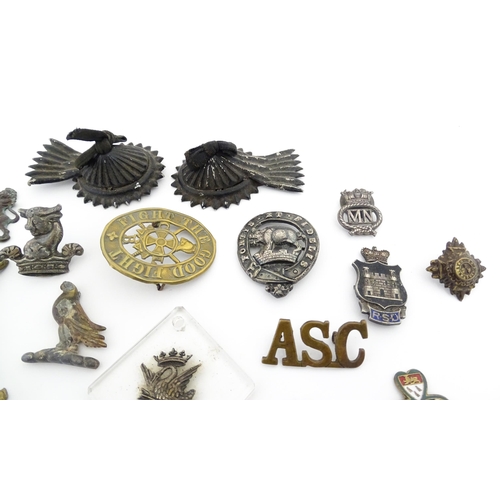 1278 - A quantity of assorted military insignia and heraldic / livery badges etc, to include a WWI Army Ser... 