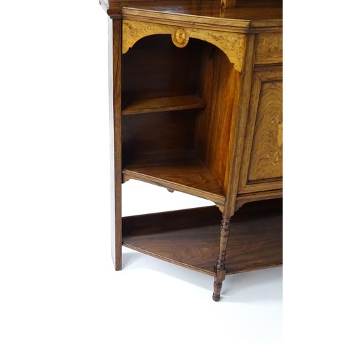 1825 - A Victorian rosewood chiffonier with a swans neck pediment above tiered shelves and mirrors, the str... 