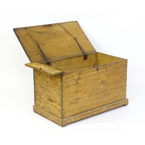 1867 - A 19thC pine blanket box with a hinged lid opening to show a candle box within. 34