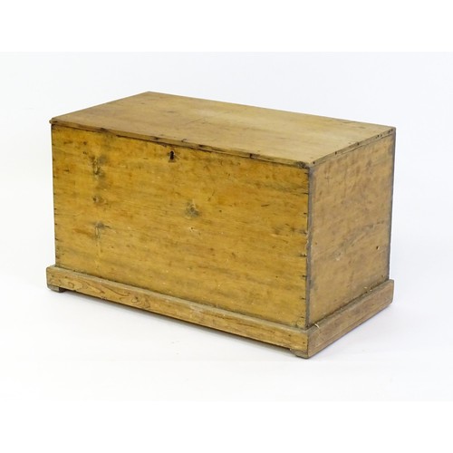 1867 - A 19thC pine blanket box with a hinged lid opening to show a candle box within. 34