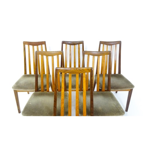 1870 - Vintage / Retro: A set of six teak G-Plan dining chairs with slatted backrests, shaped seats and rai... 