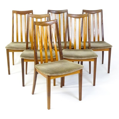 1870 - Vintage / Retro: A set of six teak G-Plan dining chairs with slatted backrests, shaped seats and rai... 