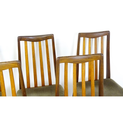 1870 - Vintage / Retro: A set of six teak G-Plan dining chairs with slatted backrests, shaped seats and rai... 