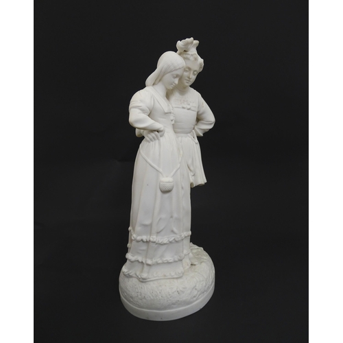 186 - A parian figural group modelled as a young couple. Approx. 14 1/2