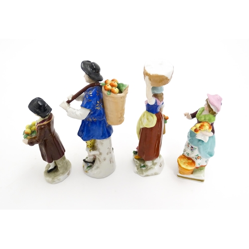 200 - Four assorted Continental figures to include examples modelled as fruit sellers, washerwomen, etc. L... 