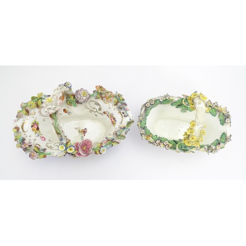 244 - Four Continental ceramic baskets with encrusted flower decoration, hand painted floral sprays and gi... 