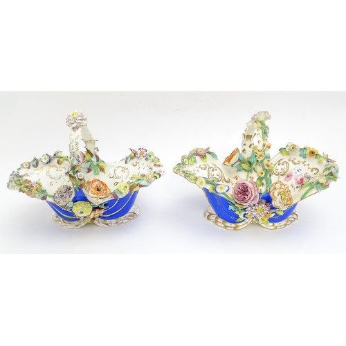 244 - Four Continental ceramic baskets with encrusted flower decoration, hand painted floral sprays and gi... 