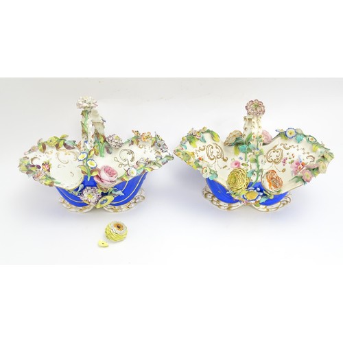 244 - Four Continental ceramic baskets with encrusted flower decoration, hand painted floral sprays and gi... 