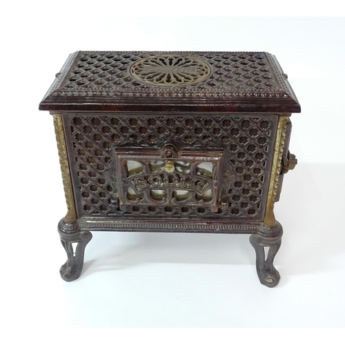 1416 - A 20thC French cast iron Godin Chauffette stove, approx 20 1/2