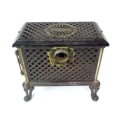 1416 - A 20thC French cast iron Godin Chauffette stove, approx 20 1/2