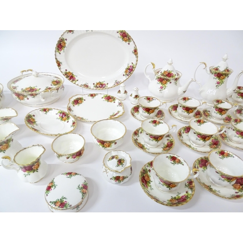 254 - A large quantity of Royal Albert tea and dinner wares in the Old Country Roses pattern, comprising p... 